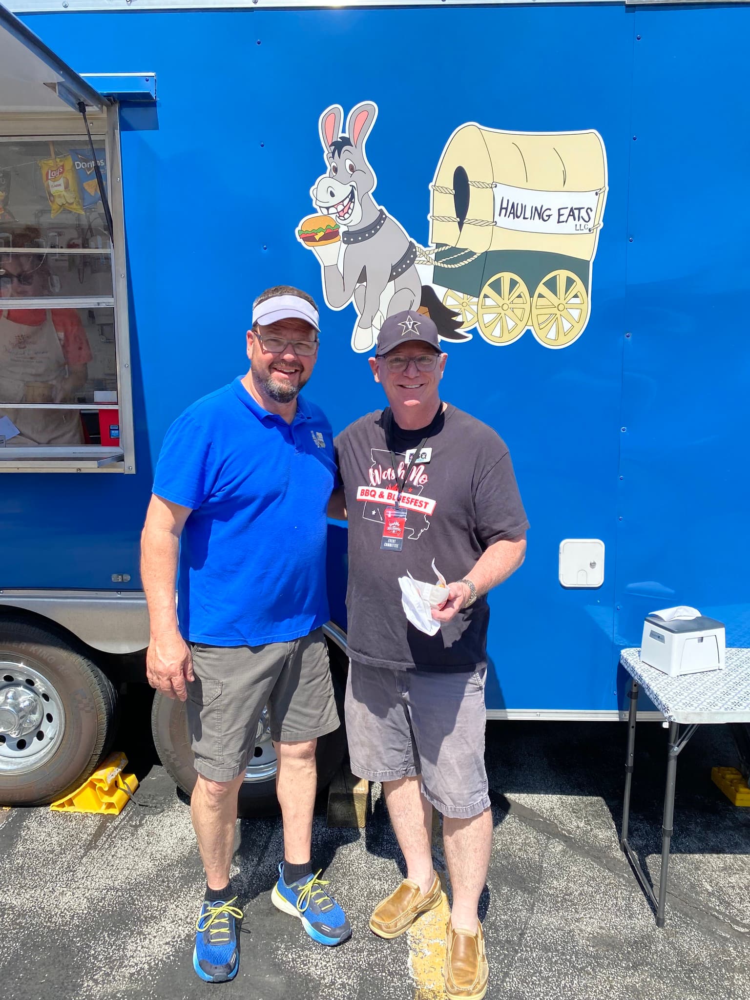 Customers enjoying themselves at the Hauling Eats trailer