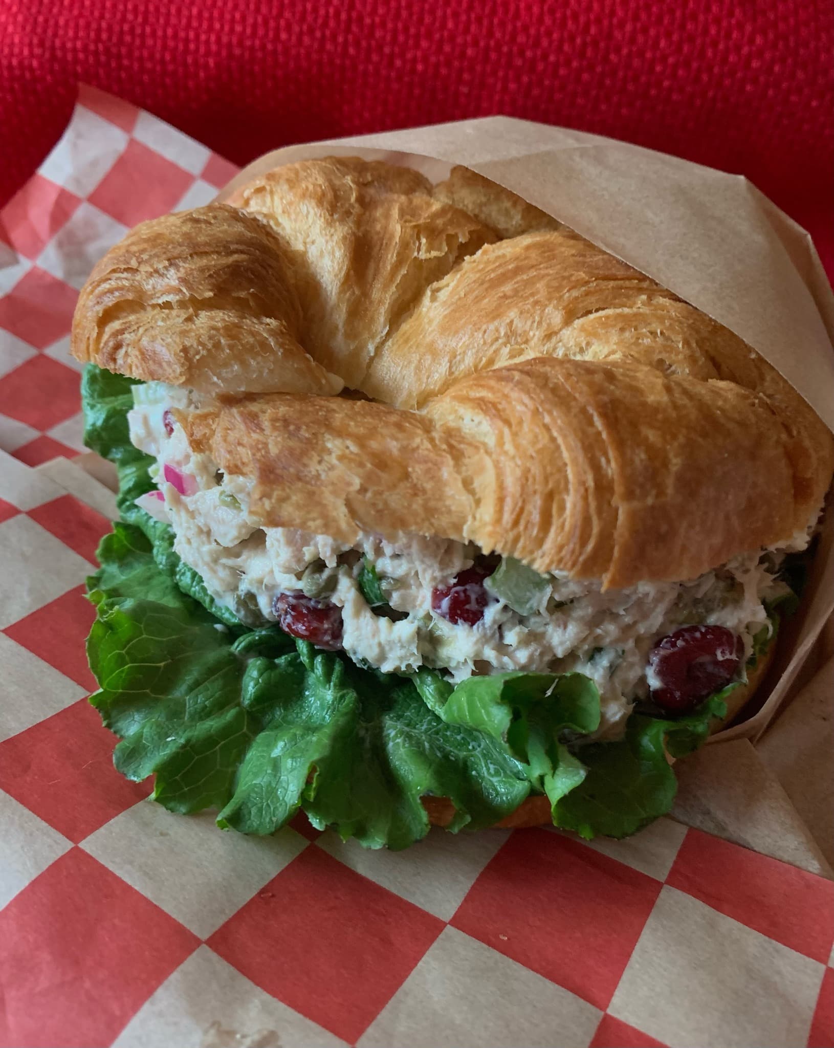 Chicken salad sandwich on a fresh croissant