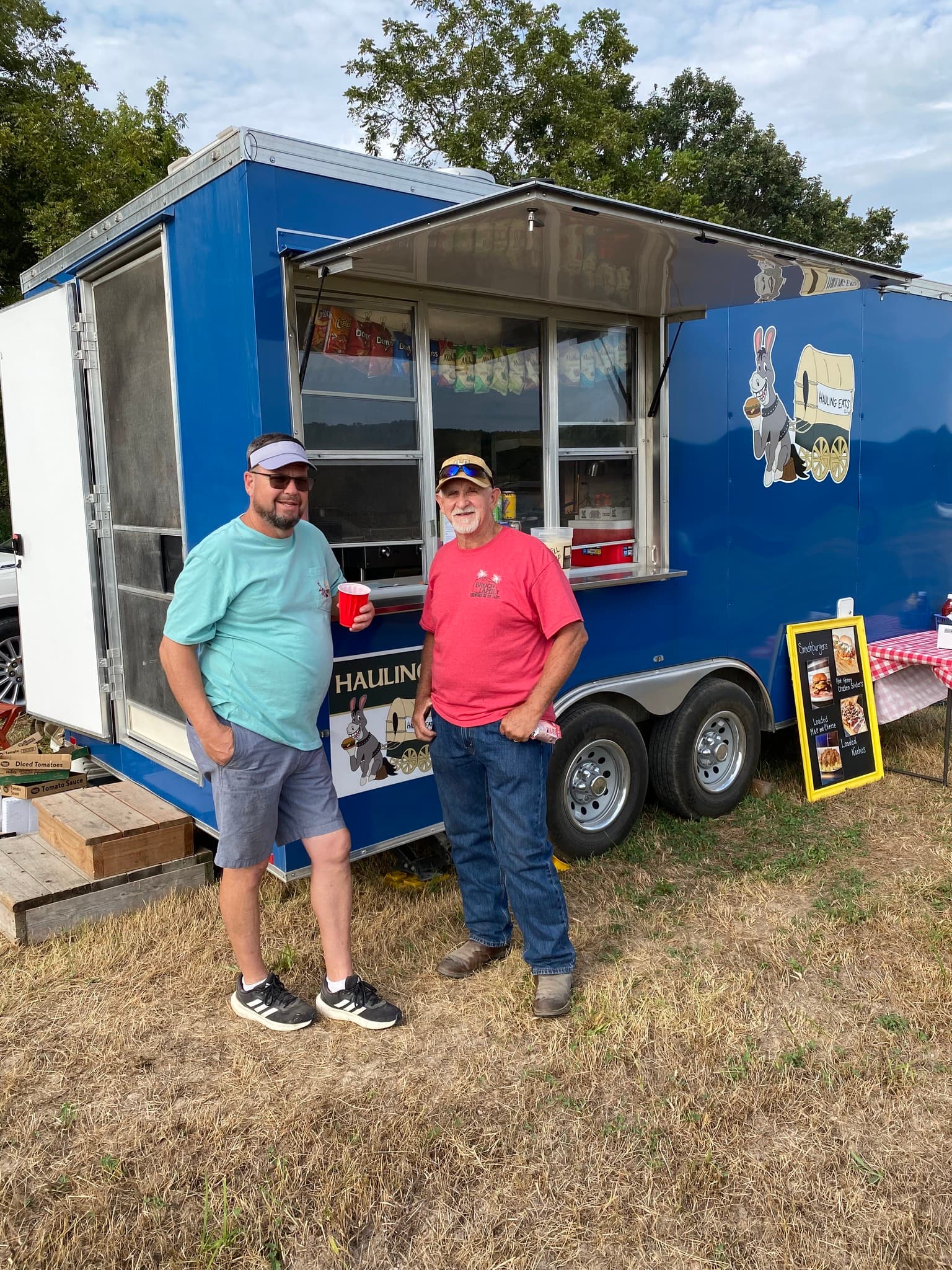 The Hauling Eats team at the trailer